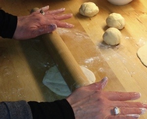 rolling out flatbread dough